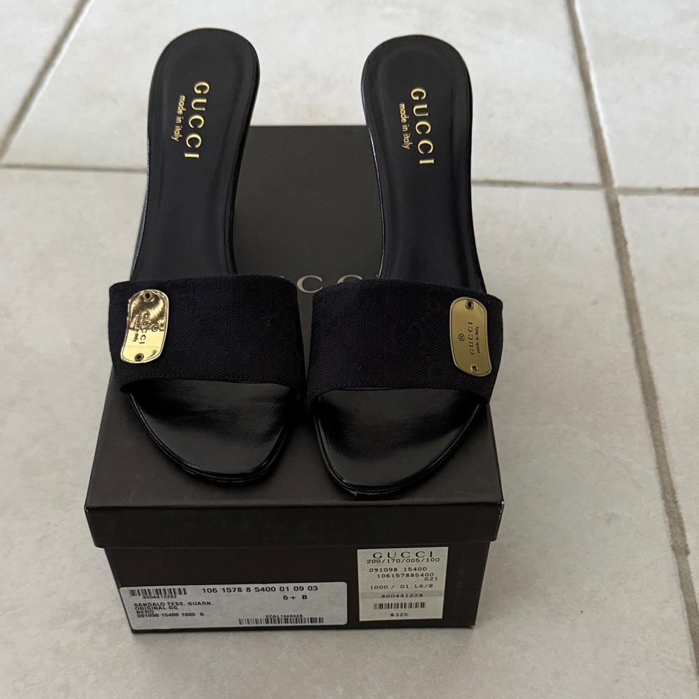 Gucci Women's Black Mules with Gold Detail